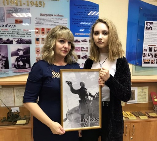 Активисты проекта «Алексей, Алешенька, сынок…»передали уникальную фотографию родственникам летчика